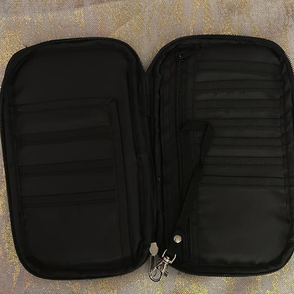 Black zipper Travel Navigator keeps all your travel documents altogether. - Picture 3 of 3